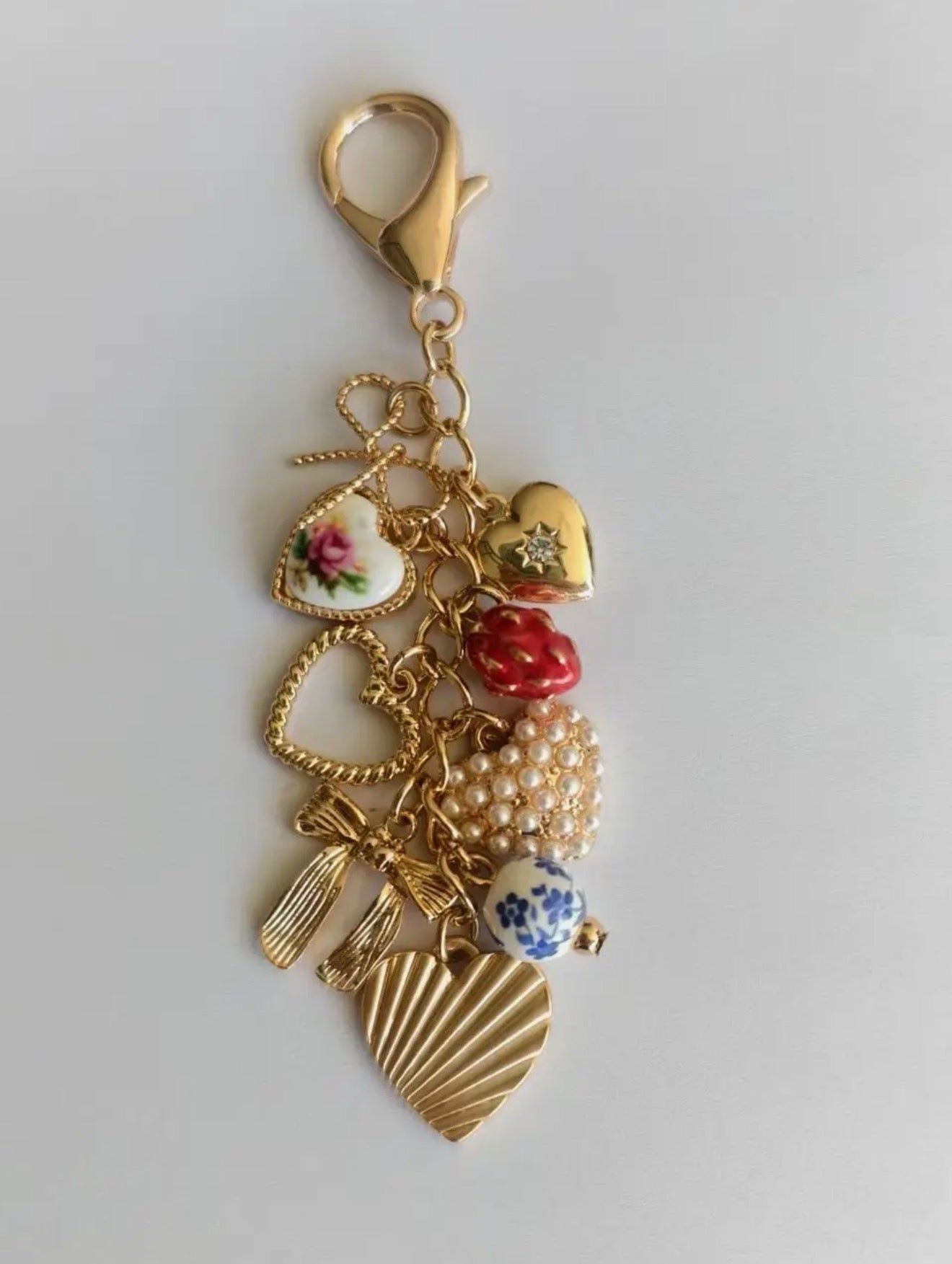 Porcelain bow hearts pearls bag charm