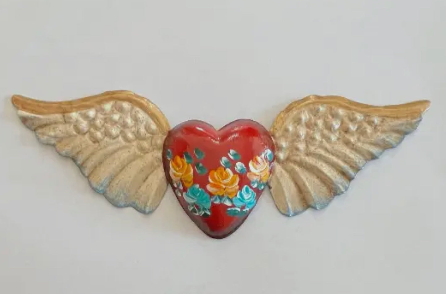 Sacred heart with wings