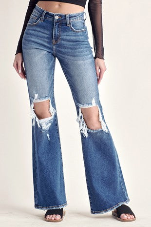 Mid rise distressed flare jean