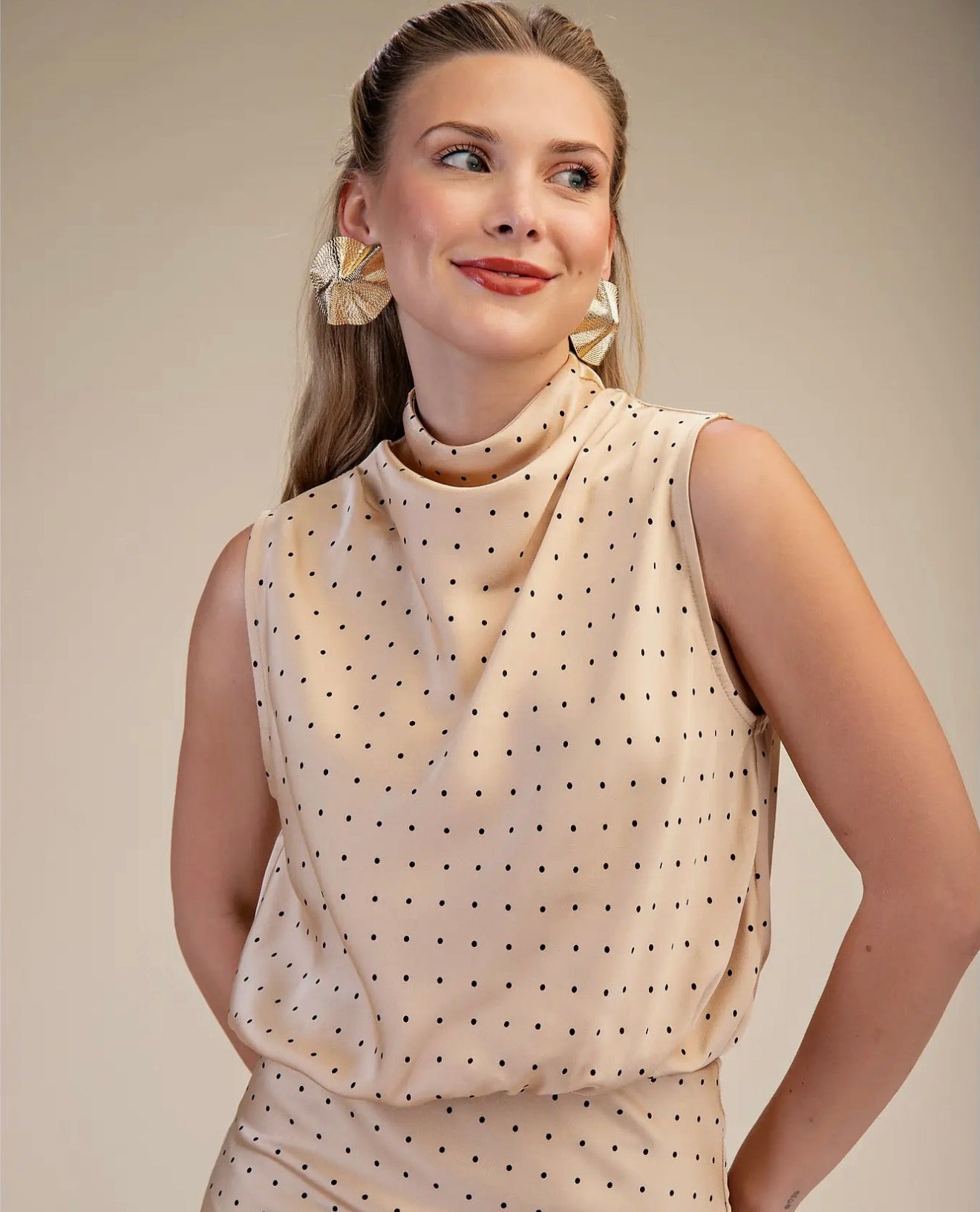 Polka dotted high neck top