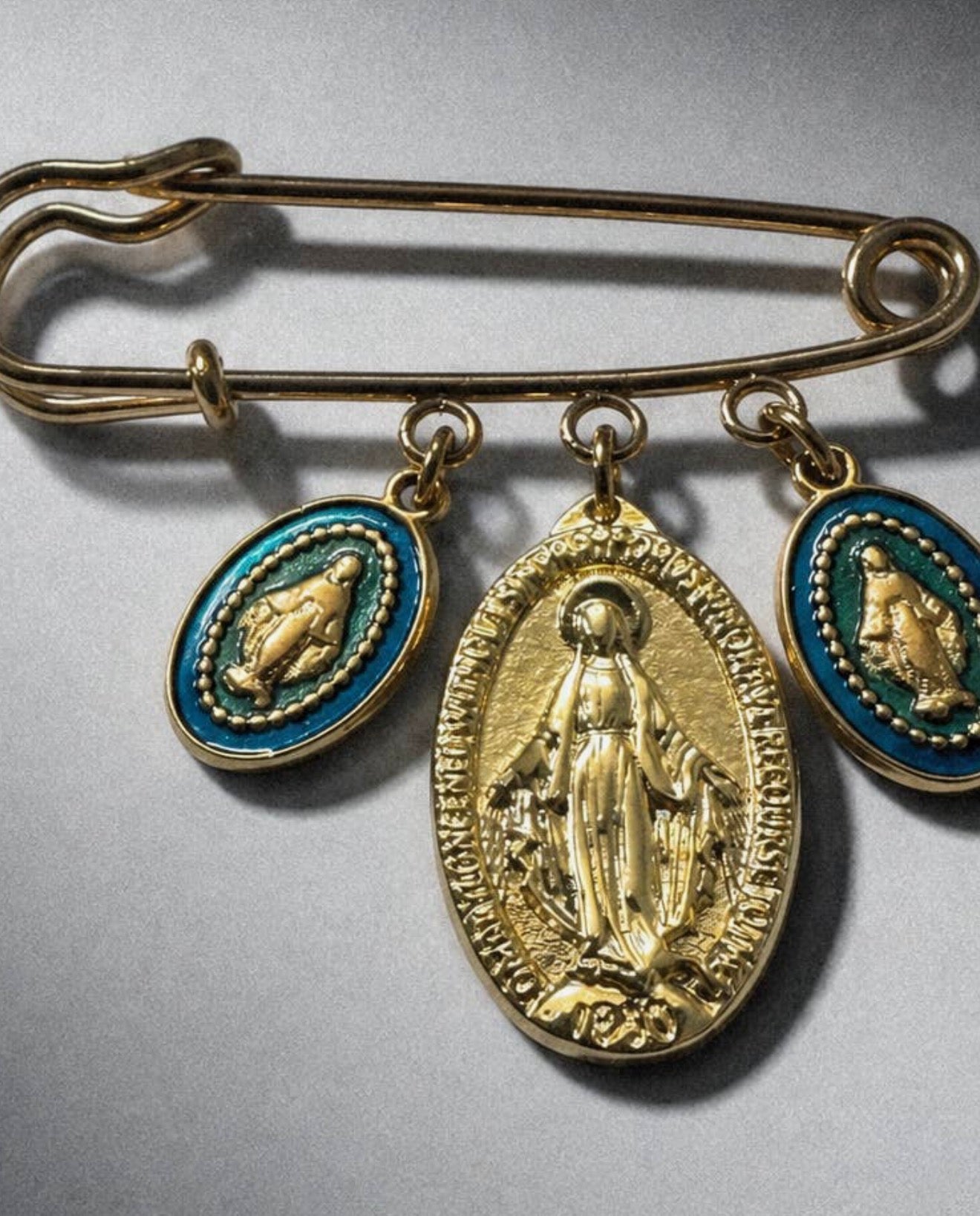 Turquoise Mary brooch