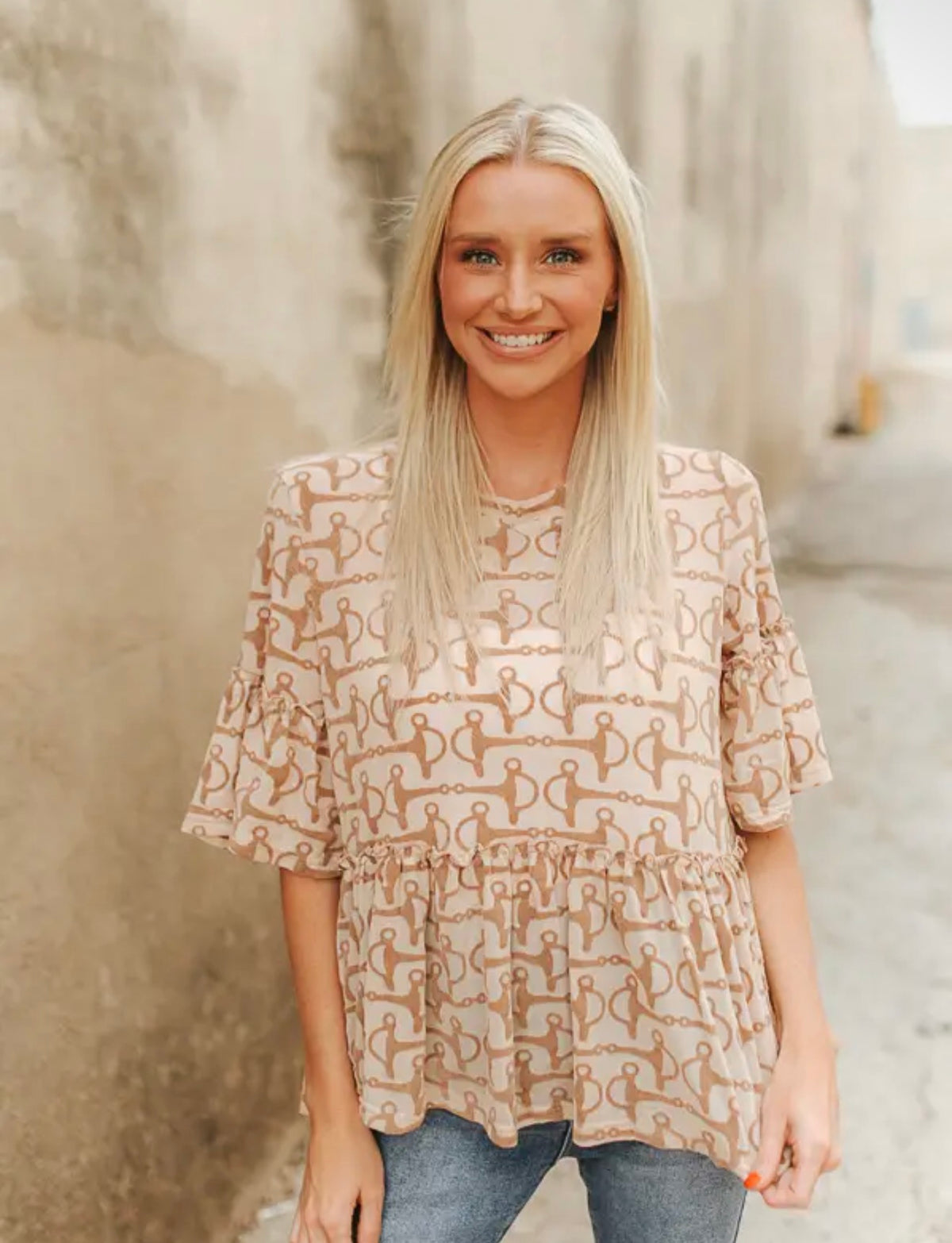 Horsebit ruffled mesh top